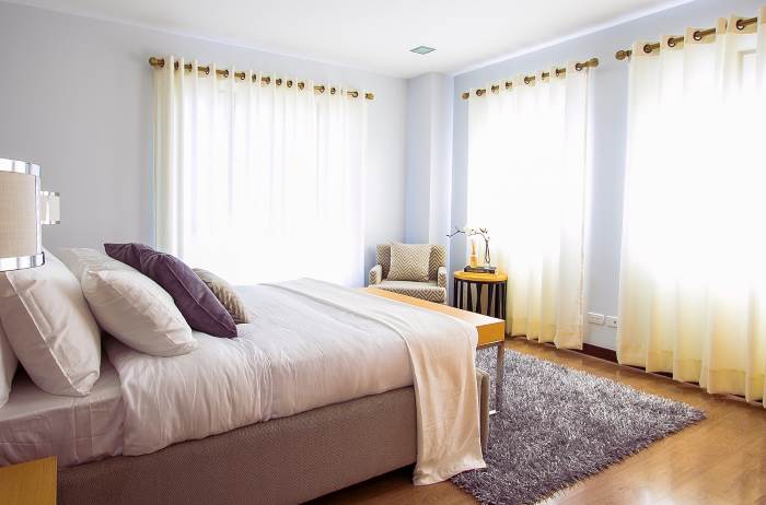 Bedroom after a furniture repair has been completed and cleaned