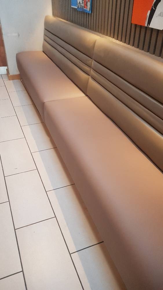 After photo of a cream leather bench