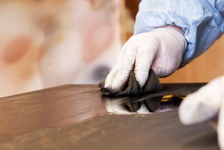 In the process of french polishing a cabinet